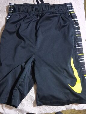 Nike Black Shorts with Yellow Swoosh and Stripe Accents